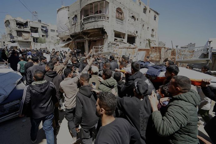 April 9, 2026, Al-Bureij, Gaza Strip, Palestinian Territory: Mourners carry the body of Al Jazeera journalist Mohammad Wishah, who was killed in an Israeli strike, during his funeral in Al-Bureij Palestinian Refugee Camp  in the central Gaza Strip, on Apr