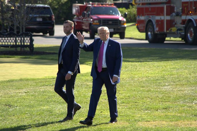 WASHINGTON, April 11, 2026  -- U.S. President Donald Trump (R) walks toward Marine One at the White House in Washington, D.C., the United States, on April 10, 2026. Trump said Friday U.S. negotiators will discuss the reopening of the Strait of Hormuz with
