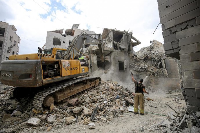 April 10, 2026, Beirut, Beirut, Lebanon: Civil defense clear wreckage of a destroyed building targeted by an Israeli air strike in Choueifat neighborhood on the edge of Beirut southern suburb, a hotbed for the Iranian-backed Hezbollah. Lebanon reeled afte