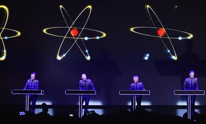 Archivo - FILED - 06 January 2015, Berlin: The German band Kraftwerk performs on stage at the 'Neuen Nationalgalerie' art museum in Berlin. German electro pop band Kraftwerk are set to perform their only concert in Germany this year on Saturday at Karlsru