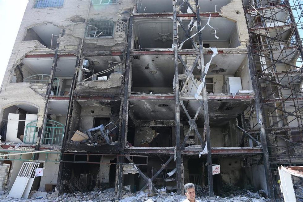 TEHRAN, April 15, 2026  -- This photo taken on April 14, 2026 shows a building destroyed in U.S. and Israeli strikes in Tehran, Iran. 