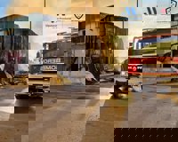 Un incendio afecta a varias naves del polígono industrial de Cajiz en Vélez-Málaga