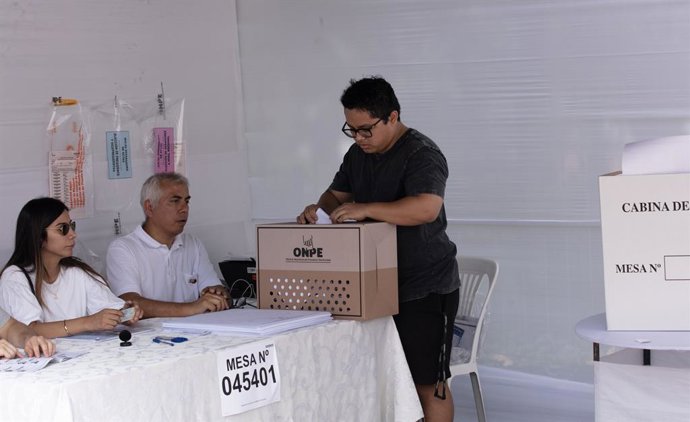 LIMA, April 13, 2026  -- A voter casts a ballot at a polling station in Lima, Peru, April 12, 2026. Peruvian President Jose Balcazar on Sunday urged citizens to vote with "calm and serenity" as the country holds general elections to choose a new president