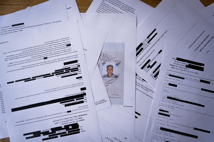 Archivo - February 11, 2026, Barcelona, Spain: Documents included in the U.S. Department of Justice release of the Jeffrey Epstein files, showing redacted Jeffrey Epstein personal email correspondence, are seen photographed on a desk.