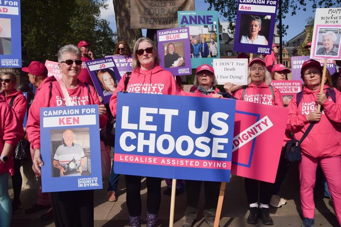 April 22, 2026, London, England, United Kingdom: Supporters of the Assisted Dying Bill from the group Dignity in Dying gather in Parliament Square urging the House of Lords to pass the bill.