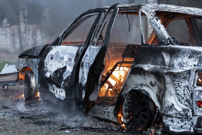 April 3, 2026, Kramatorsk, Donetsk Region, Ukraine: The car burning at the site of air strike by a guided air bomb which hit right next to a small corner grocery store.