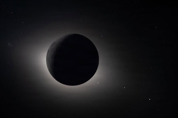 April 8, 2026, Orion Capsule, Outer Space: The Moon, backlit by the Sun during a solar eclipse, photographed by the Orion spacecraft external camera mounted on the solar array as the Artemis II mission approaches the Moon showing on day 6 of the mission a