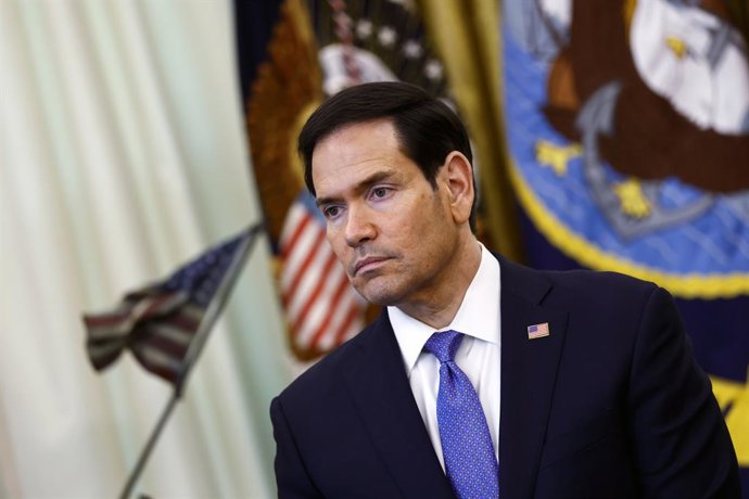 April 23, 2026, Washington, District Of Columbia, USA: United States Secretary of State Marco Rubio listens as US President Donald Trump speaks to the media in the Oval Office at the White House. Washington, DC, USA, 23 April 2026. President Trump met wit