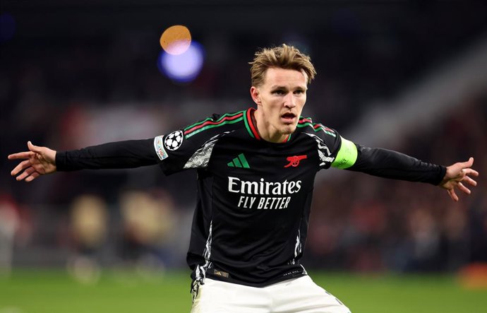 Archivo - 04 March 2025, Netherlands, Eindhoven: Arsenal's Martin Odegaard reacts after the his goal during the UEFA Champions League round of 16 first-leg soccer match between PSV Eindhoven CF and Arsenal F.C. at Philips Stadium. Photo: Peter Lous/PA Wir