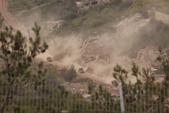 BEIJING, April 28, 2026  -- An Israeli military convoy maneuvers in southern Lebanon as seen from northern Israel, April 26, 2026. Israeli Prime Minister Benjamin Netanyahu has ordered the military to forcefully strike Hezbollah targets in Lebanon, accord