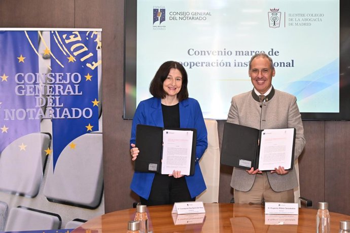 La presidenta del Consejo General del Notariado (CGN), Concepción Pilar Barrio Del Olmo, y el decano del ICAM, Eugenio Ribón.
