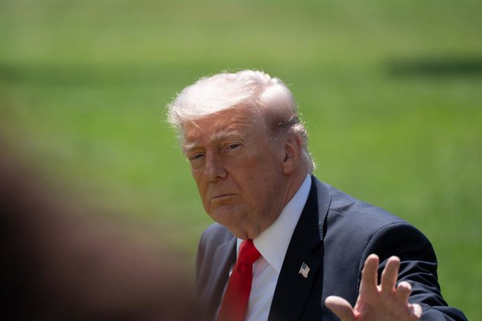 May 1, 2026, Washington, Dc, United States: US President Donald Trump arrives on the South Lawn of the White House to speak with members of the media before boarding Marine One in Washington, DC, USA, Friday, May 1, 2026. Trump voiced frustration with the