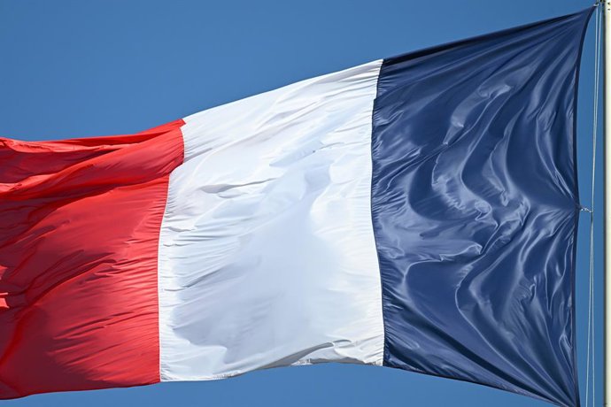 March 18, 2026, Paris, Ile-De-France (Region, France: The French flag flies above the ÉlysAe Palace during the Cabinet meeting on 18 March 2026