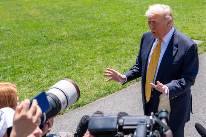 May 12, 2026, Washington, Dc, United States: President DONALD TRUMP departs the White House on the first leg of his trip to China on May 12, 2026. The President spoke with the media on a number of issues including the war in Iran.,Image: 1098392746, Licen
