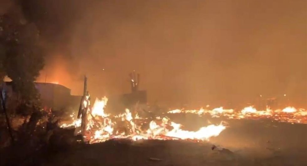 Archivo - Incendio en un asentamiento de Palos de la Frontera (Huelva) en septiembre de 2023.