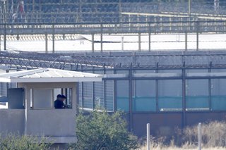 Punta Peuco, 23 de diciembre de 2016.  Gendarmes son fotografiados previo a la ceremonia ecumenica privada en la carcel de Punta Peuco donde ocho de los reos pediran disculpas por los crimenes y violaciones a los Derechos Humanos que cometieron. Andres
