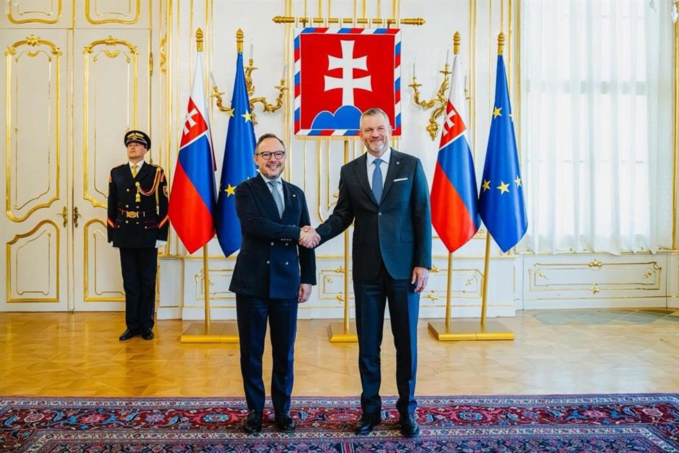 Espot y Pellegrini durante su encuentro.