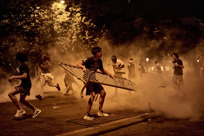 May 30, 2026, Paris, France: Clashes between supporters and police on Champs-Elysees following PSG's victory in 2026 Champions League.