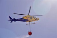 Declarado un incendio en Sanlúcar la Mayor (Sevilla) que moviliza a dos helicópteros