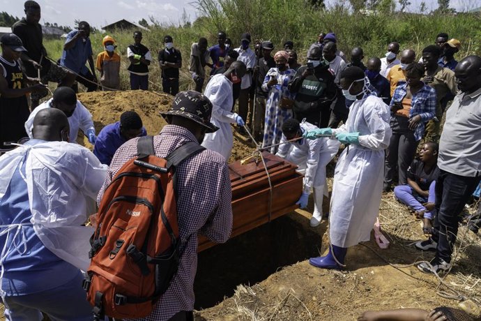 BUNIA, May 29, 2026  -- Medical workers bury the body of an Ebola victim in Bunia, the capital of Ituri Province in the Democratic Republic of the Congo, May 25, 2026. TO GO WITH "Feature: In eastern DR Congo, Ebola outbreak tests response amid rising fea