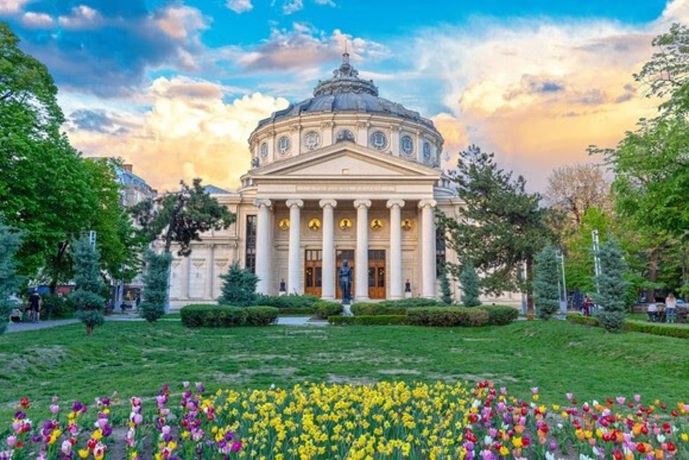 BUCHAREST, ROMANIA - 28.04.2019: Romanian Atheneum, an important concert hall and a landmark in Bucharest, Romania. Sunset colors.
