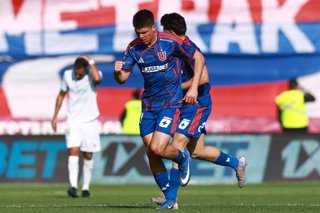 Futbol, Universidad de Chile vs Audax Italiano Fecha 6, Copa de la Liga 2026. El jugador de Universidad de Chile Lucas Romero, centro, celebra su gol durante el partido de copa de la Liga por el grupo D contra Audax Italiano disputado en el estadio