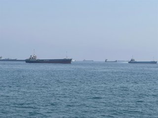 KHASAB, May 29, 2026  -- This photo taken with a mobile phone shows merchant vessels stranded in the waters of the Strait of Hormuz, near Khasab, a small town in northern Oman, May 29, 2026.,Image: 1106562679, License: Rights-managed, Restrictions: , Mode