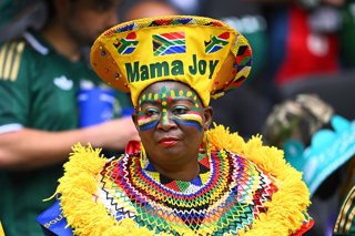 11 June 2026, Mexico, Mexico city: A South Africa fan is seen wearing a hat with the inscription "Mama Joy" during the 2026 FIFA World Cup Group A soccer match between Mexico and South Africa at the Azteca Stadium 