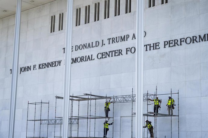 June 12, 2026, Washington, District Of Columbia, USA: Workers prepare to remove the name of United States President Donald J Trump from the facade of the John F. Kennedy Memorial Center for the Performing Arts in Washington, DC, USA, after a federal judge