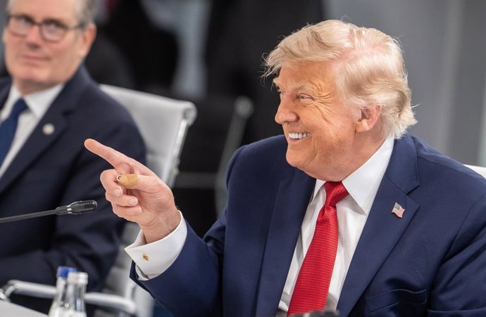 17 June 2026, France, Evian: US President Donald Trump attends a working session on "Promoting Balanced, Inclusive, and Sustainable Economic Growth for the Benefit of All" during the G7 Summit in Evian. Photo: Michael Kappeler/dpa-Pool/dpa