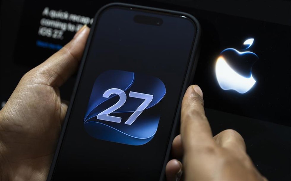 June 10, 2026: In this photo illustration, a person interacts with a smartphone displaying the iOS 27 logo on June 10, 2026, in New Delhi, India.