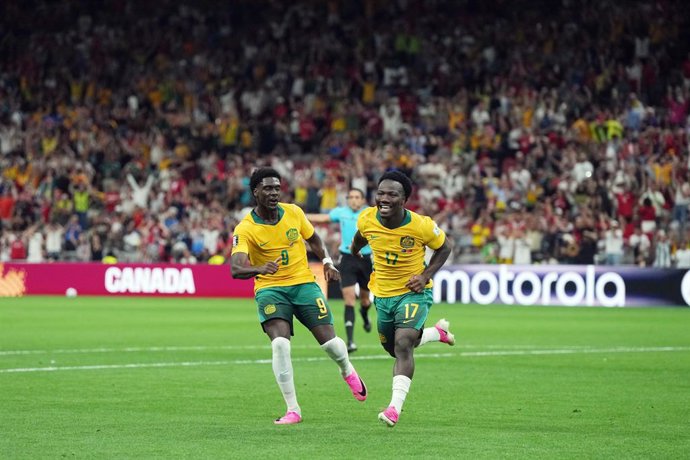 13 June 2026, Canada, Vancouver: Australia's Nestory Irankunda celebrates scoring his side's first goal with teammate Mohamed Toure during the 2026 FIFA World Cup Group D soccer match between Australia and Turkey at BC Place Vancouver. Photo: Darryl Dyck/