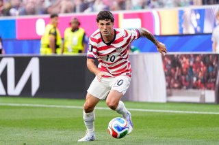 Christian Pulisic of USA runs with the ball during the FIFA World Cup 2026 Group D match between USA and Paraguay at Los Angeles Stadium on June 12, 2026 in Los Angeles, California.