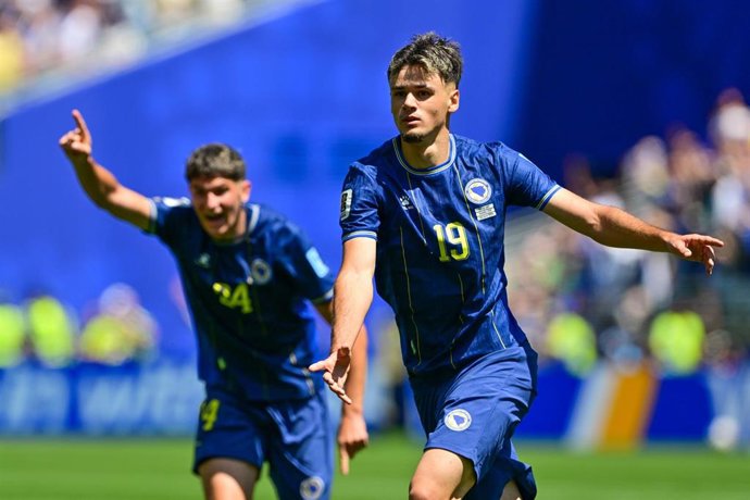 24 June 2026, US, Seattle: Bosnia and Herzegovina's Kerim Alajbegovic celebrates after scoring during the 2026 FIFA World Cup Group B match between Bosnia and Herzegovina and Qatar. Photo: Dirk Waem/Belga/dpa