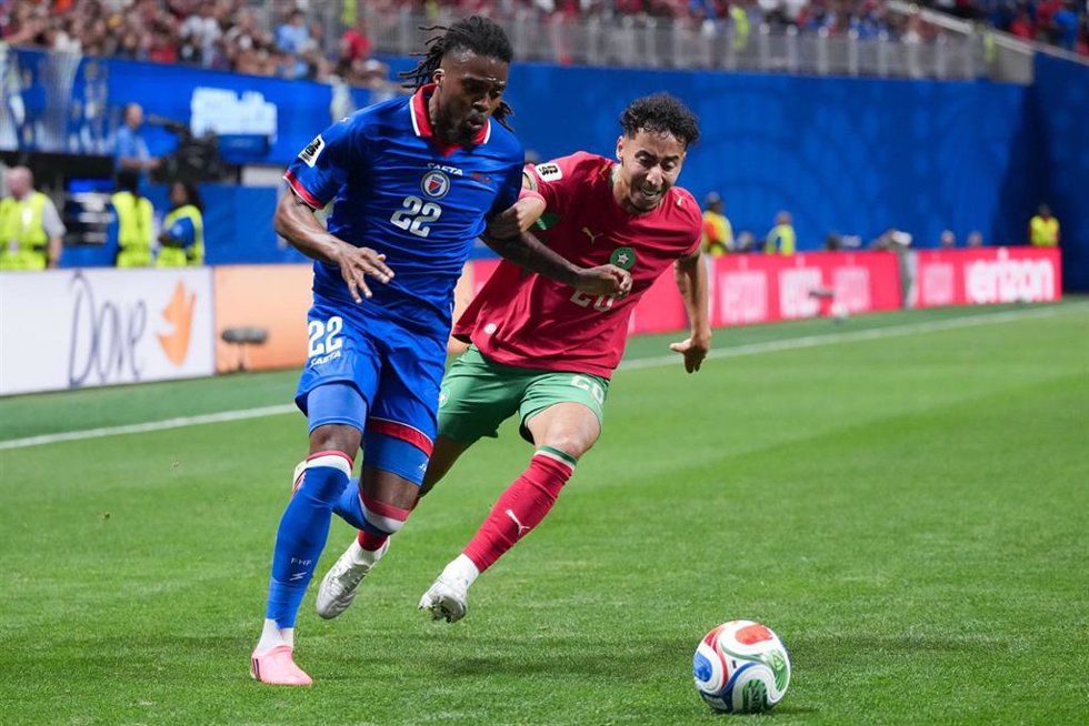 June 24, 2026, Atlanta, Georgia, United States: Jean-Kevin Duverne of Haiti (L) runs with the ball under pressure from Anass Salah-Eddine of Morocco (R) during a FIFA Men's World Cup 2026 Group Stage football match between Morocco and Haiti at Atlanta Sta
