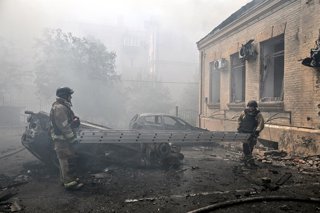June 26, 2026, Zaporizhzhia, Ukraine: Rescuers from the State Emergency Service carry a telescopic ladder during a response effort to a Russian attack, Zaporizhzhia, Ukraine, June 26, 2026. In the afternoon, Russian forces launched two ballistic missiles 