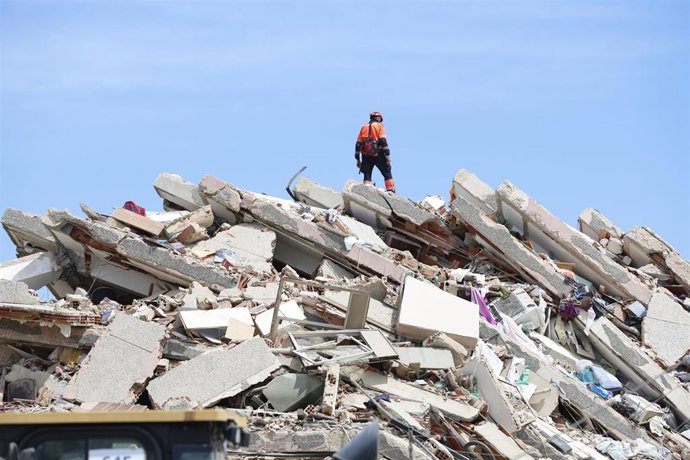 LA GUAIRA, June 29, 2026  -- A rescuer stands on the rubble of a collapsed building in Caraballeda, La Guaira state, Venezuela, June 28, 2026. Venezuelan National Assembly President Jorge Rodriguez said Sunday that the death toll from two powerful earthqu