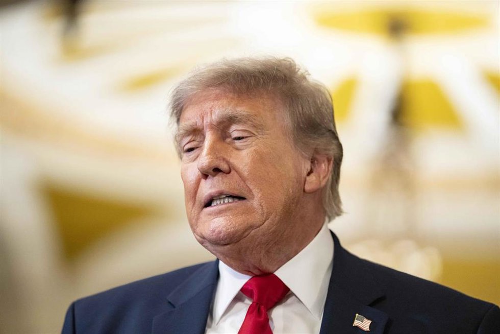 June 24, 2026, Washington, District Of Columbia, USA: United States President Donald J Trump responds to a question as he walks through in the Ohio Clock Corridor outside the US Senate Chamber in the US Capitol in Washington, DC, USA, with US Senate Major
