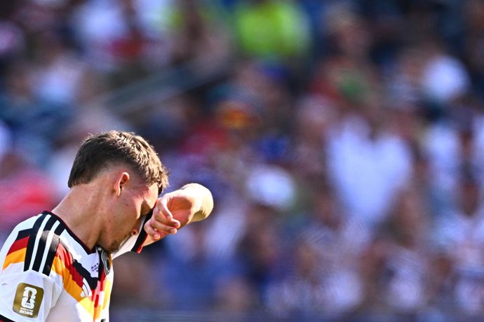 29 de junho de 2026, EUA, Foxborough: O alemão Florian Wirtz reage após sofrer um gol durante a partida das oitavas de final da Copa do Mundo da FIFA 2026 entre Alemanha e Paraguai, no Boston Stadium. Foto: Tom Weller/dpa - AVISO IMPORTANTE: Os regulament