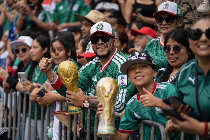 13 June 2026, Mexico, Mexico City: Performers dressed in costumes inspired by Mexican culture and soccer take part in the 2026 FIFA World Cup parade. Tourists and football fans take part in the parade. Photo: Felix Marquez/dpa