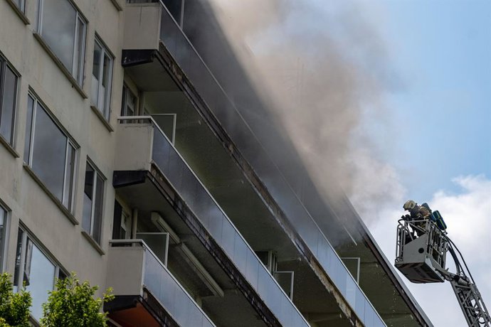 July 1, 2026, Antwerp, Belgium: Firefighters pictured at the scene of a fire in an apartment building in the August Vermeylenlaan street in Antwerp on Wednesday 01 July 2026. According to the first information the fire broke out on the eighth level of the