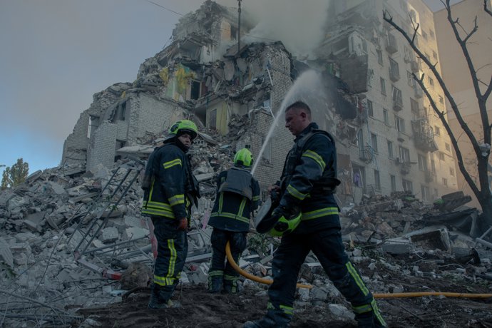 July 2, 2026, Kyiv (, Kyiv Oblast, Ukraine: Rescuers battle flames and search for survivors in the ruins of a partially collapsed nine-story residential building in Kyiv's  following a large-scale Russian overnight drone and missile attack, damaging 