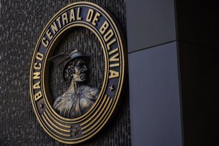 June 29, 2026, La, Paz, Bolivia: LA PAZ, BOLIVIA - JUNE 30, 2026: People walk near currency exchange booths in La Paz, Bolivia, on June 30, 2026, as the country operates under its new flexible exchange rate regime introduced by the government and implemen