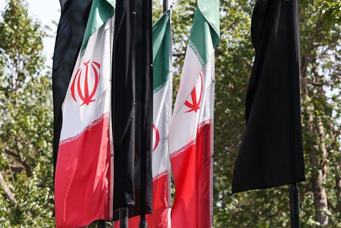 IRAN, TEHRAN - JULY 3, 2026: Iranian and black flags are seen in a street on the eve of the state funeral of Supreme Leader Ali Khamenei (1939-2026) set to take place from July 4 to 9. Khamenei was killed in a joint US-Israeli airstrike on his residence o