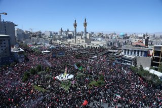 MASHHAD, July 10, 2026  -- People attend the funeral procession of Iran's late Supreme Leader Ali Khamenei in Mashhad, Iran, July 9, 2026. Ali Khamenei was laid to rest in the northeastern Iranian city of Mashhad on Thursday.