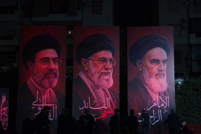 July 8, 2026, Beirut, LB: BEIRUT, LEBANON - JULY 8, 2026: Portraits of Iranian religious leaders Ayatollah Ruhollah Khomeini, Ayatollah Ali Khamenei and Mojtaba Khamenei are displayed during a funeral ceremony organized by Hezbollah in Beirut's southern s