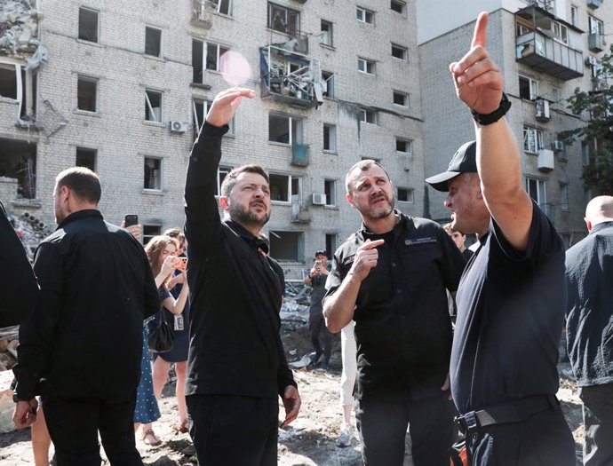 July 2, 2026, Kyiv, Ukraine: President of Ukraine Volodymyr Zelenskyy, Minister of Internal Affairs of Ukraine Ihor Klymenko and chief of the State Emergency Service of Ukraine Andrii Danyk (L to R) visit a severely damaged apartment block in the Darnytsk