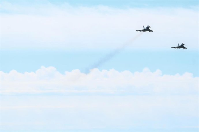 13 July 2026, Lower Saxony, Wittmund: Two Airbus Defence and Space Eurofighter Typhoons fly over Tactical Air Force Wing 71 "Richthofen" at Wittmund Air Base in Wittmund, Germany. Photo: Lars Penning/dpa