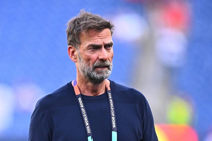 09 July 2026, US, Foxborough: Juergen Klopp, TV analyst for MagentaTV, reacts after the 2026 FIFA World Cup quarter-final match between France and Morocco at Boston Stadium. Photo: Tom Weller/dpa - PLEASE NOTE: In accordance with FIFA regulations, these i