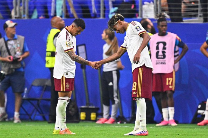 14 July 2026, US, Arlington: Spain's Pedro Porro (L) celebrates scoring his side's second goal with teammate Lamine Yamal during the 2026 FIFA World Cup semi-final soccer match between France and Spain at the Dallas Stadium. Photo: Tom Weller/dpa